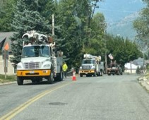 Avista Utilities working to install upgraded power from the nearby substation up Division Street in Wardner and to site.
