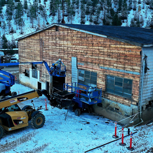 Removal of hazardous materials from the roof and siding of the old machine shop took place in November of 2022. 